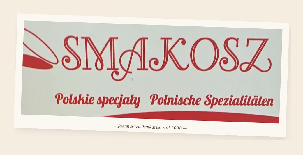 Joannas Visitenkarte mit dem Smakosz-Logo, in roter Skript-Schrift, Untertitel: Polskie specjały · Polnische Spezialitäten